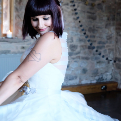 Beautiful rock and roll bride smiling during first dance in Lyde Arundel in Hereford
