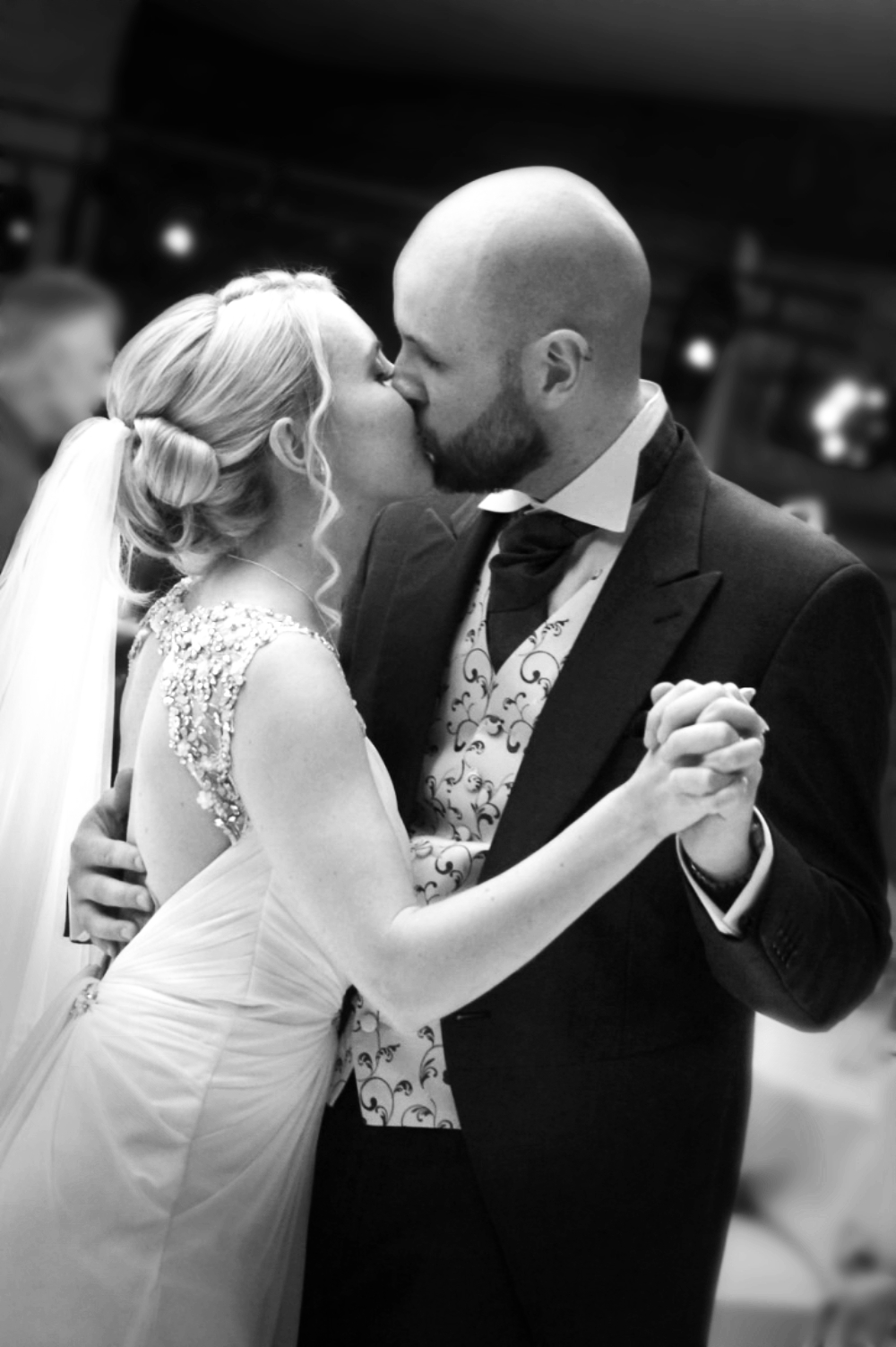 Bride and Groom kiss during first dance at Castle Bromwich Hall in Birmingham
