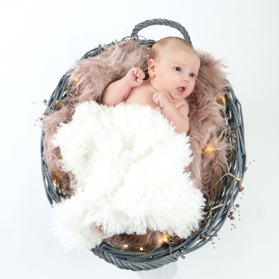 cute baby in a basket